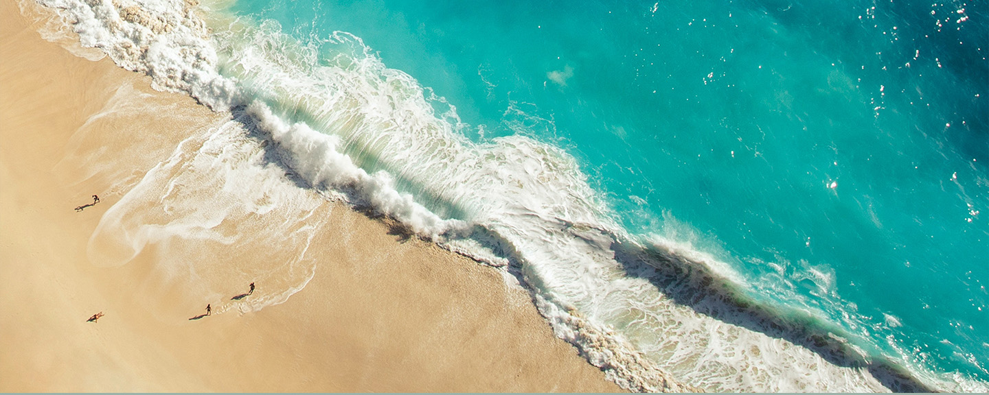 Beach wave crashing on shore